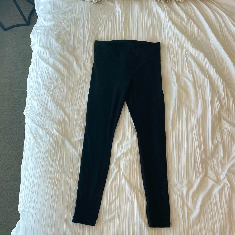 2 pairs of Athleta leggings in MEDIUM. Good condition.